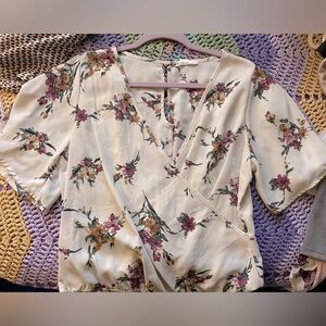 Loose floral criss cross top